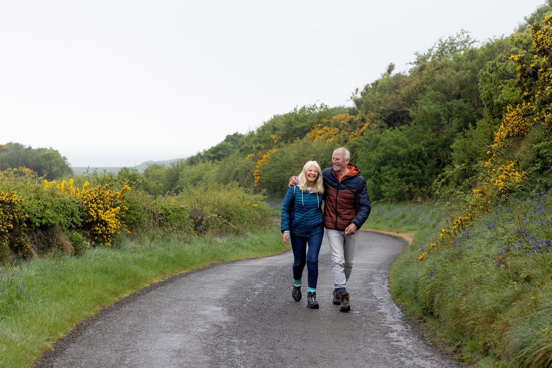 Retired couple walking outdoors together