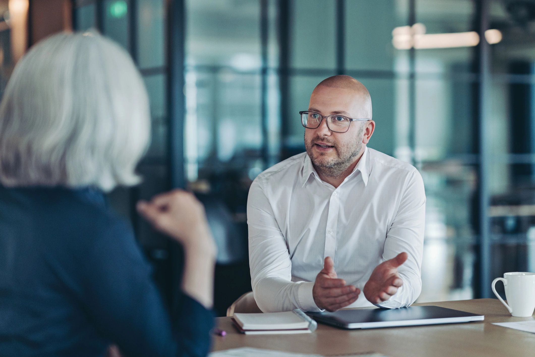 Advisor speaking with a client during a meeting